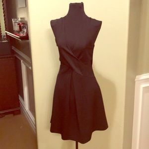 Black sleeveless plunging neckline dress